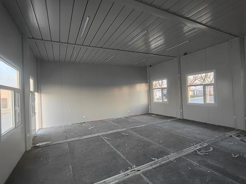 KUBO modular training room during interior fit-out with windows, lighting and panel-lined walls