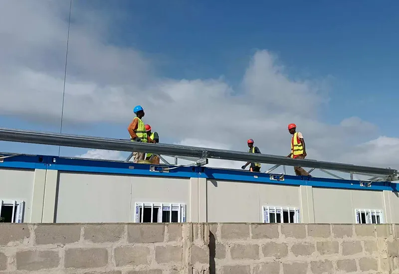 Prefabricated office complex forming EPC headquarters inside secured construction camp