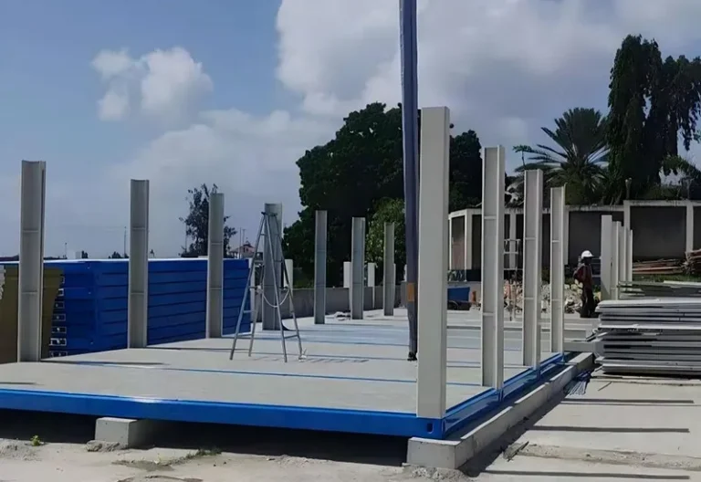 Steel base frames and upright columns during assembly of the Tanzania EPC camp buildings