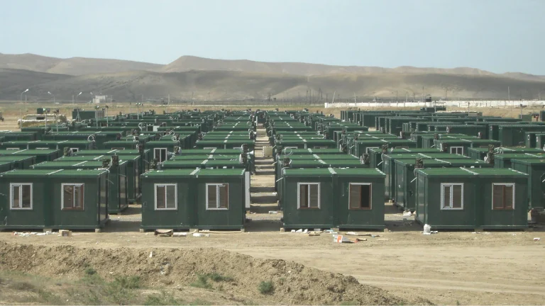 Exterior view of container workforce camp buildings for dining and recreation support facilities