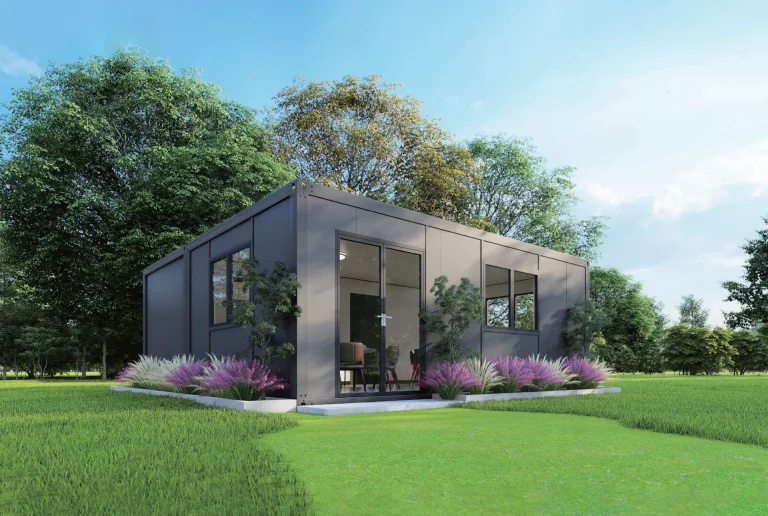 Single modular guest accommodation unit with full-height glazing in a landscaped setting
