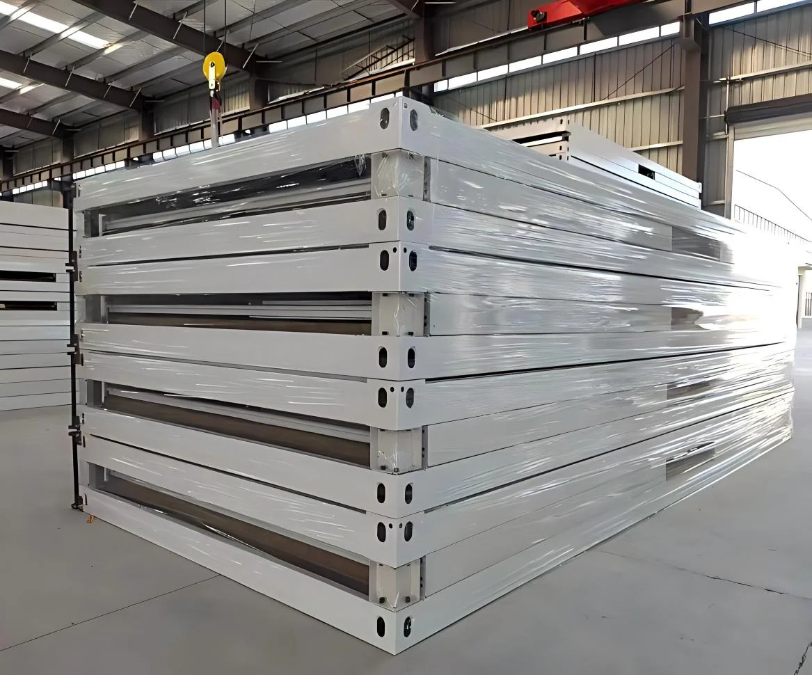 Flat pack modular building frames stacked and wrapped for storage or transport