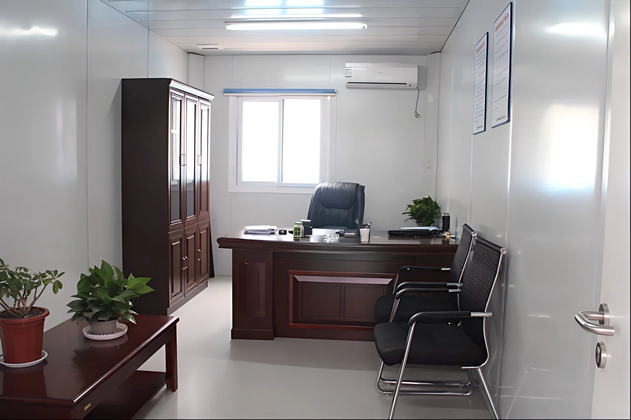 Portable modular office interior with desks and workstations