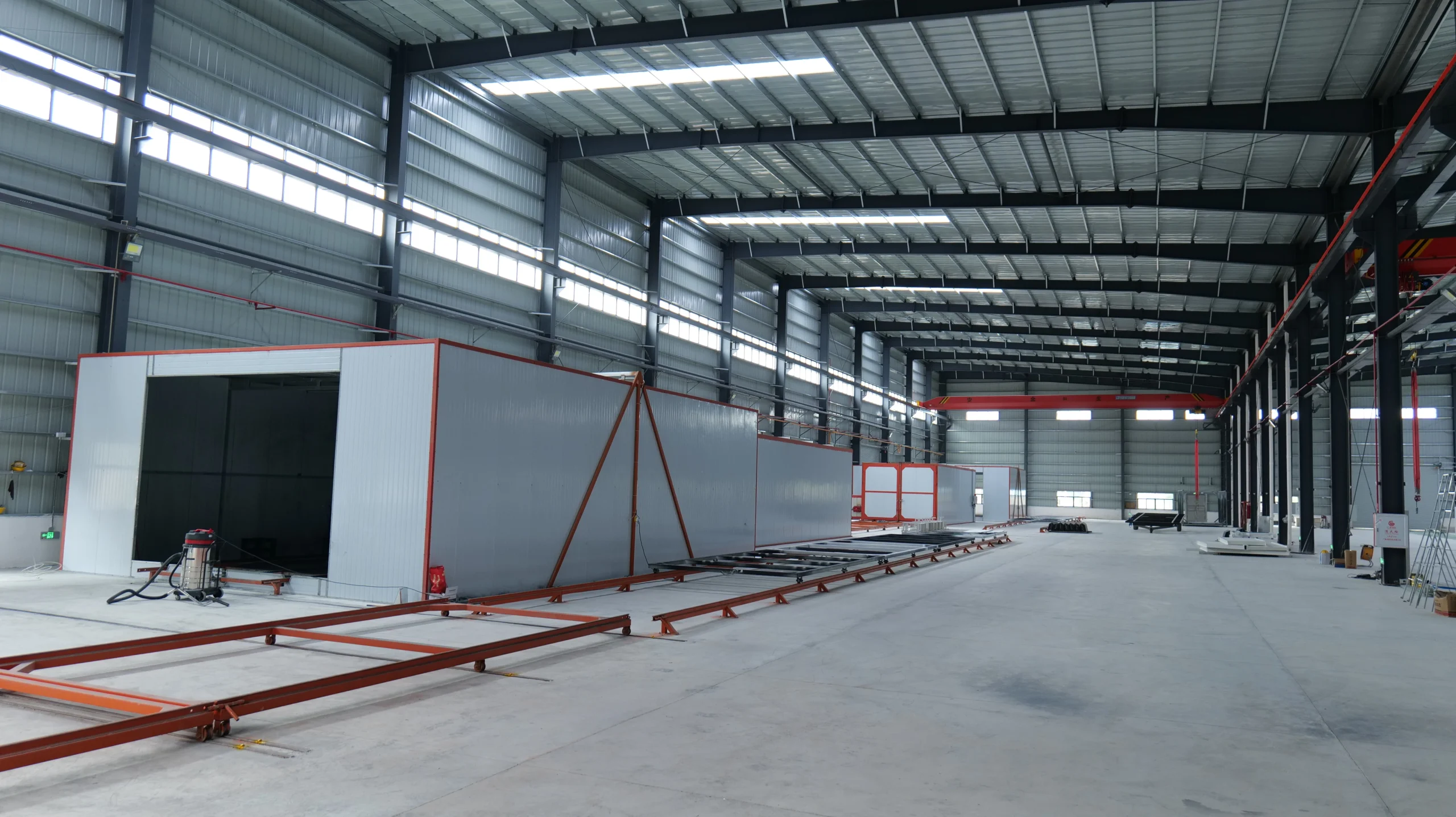 Modular building units progressing through a supplier production facility