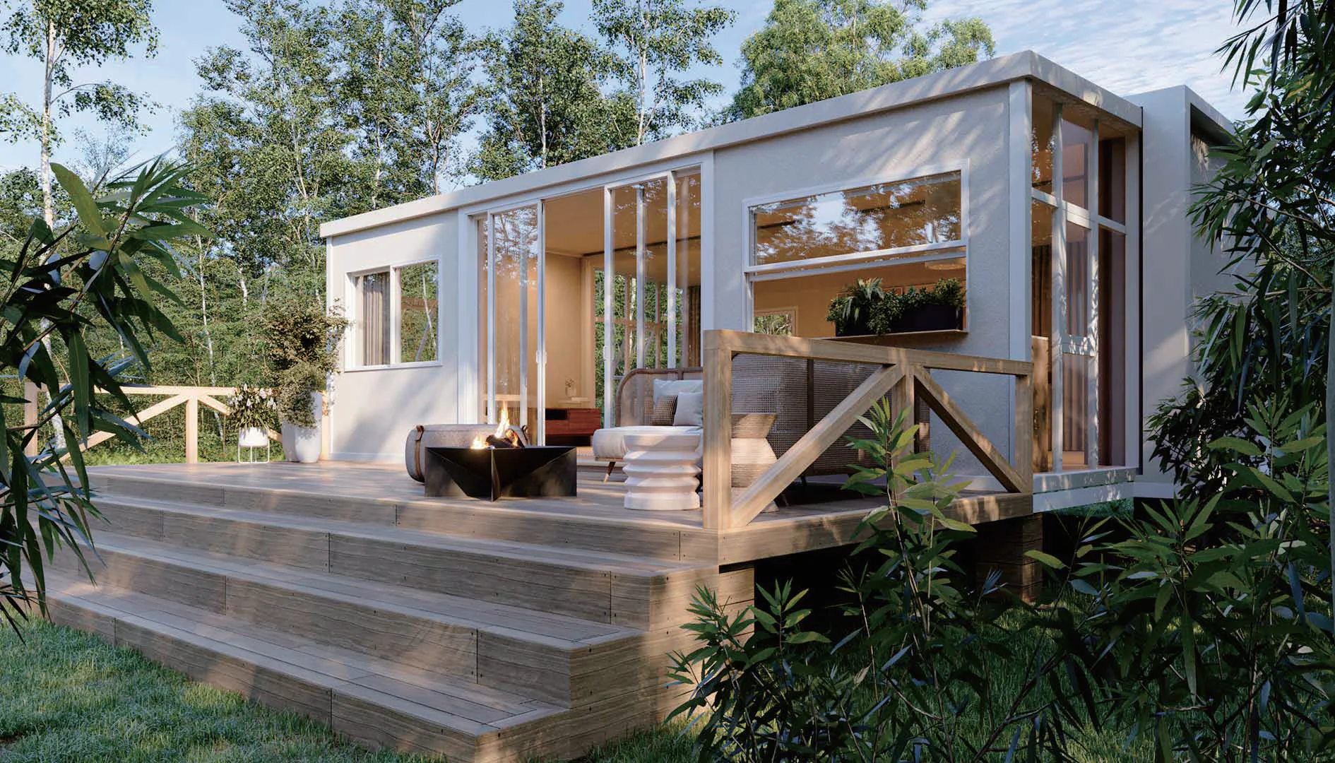 Modular eco-lodge guest units positioned along a forested slope