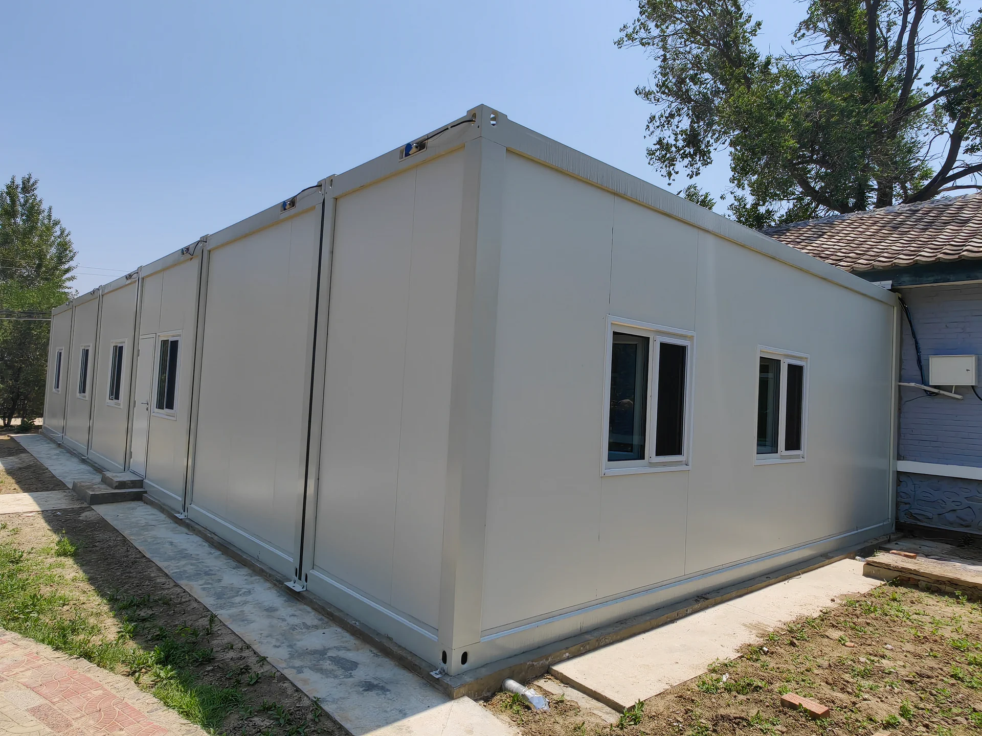 Exterior of a modular medical support building for a project camp