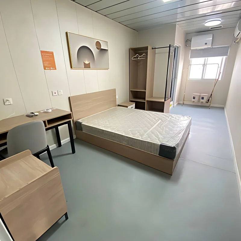 Furnished modular dormitory room illustrating mining camp accommodation planning