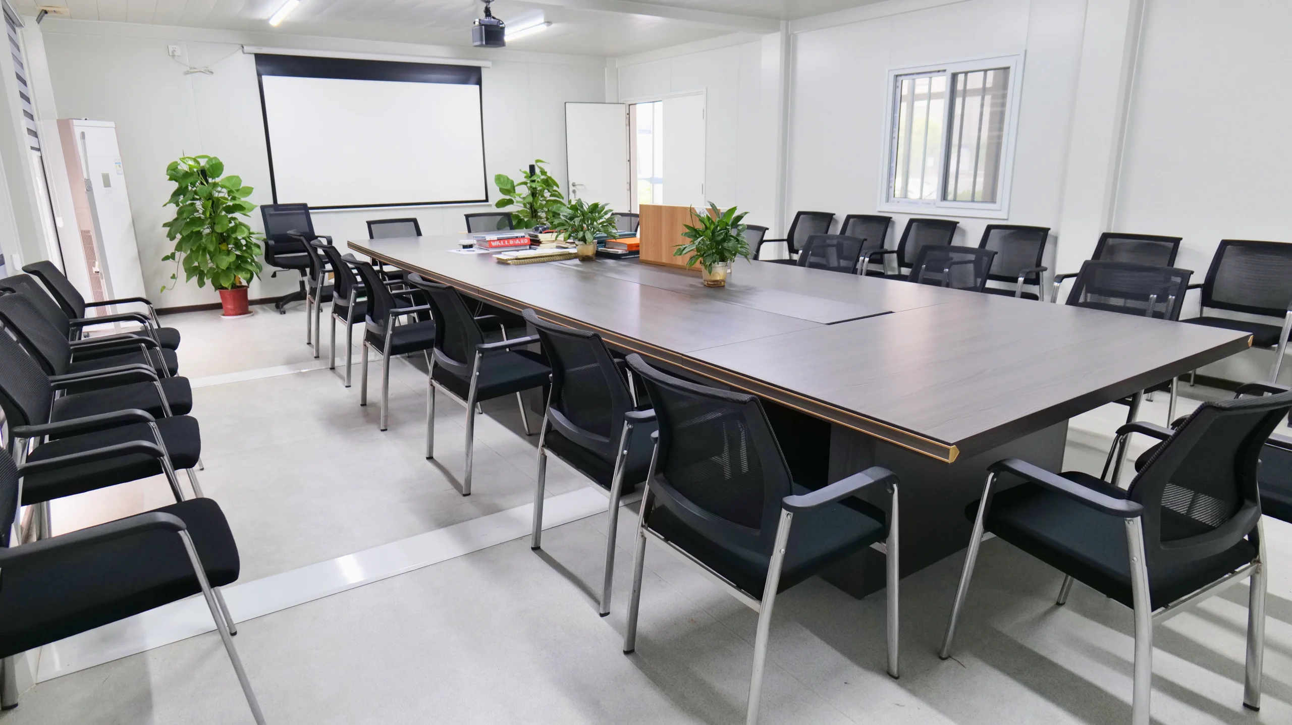Interior of a modular container site office conference room