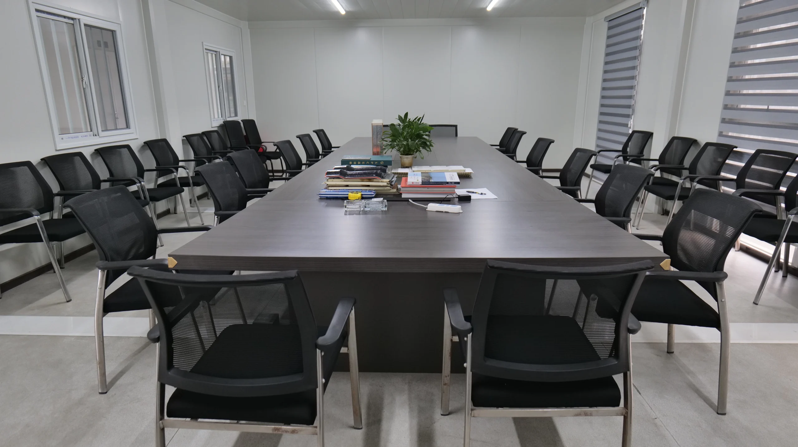 Furnished meeting room inside a modular mining camp administration building