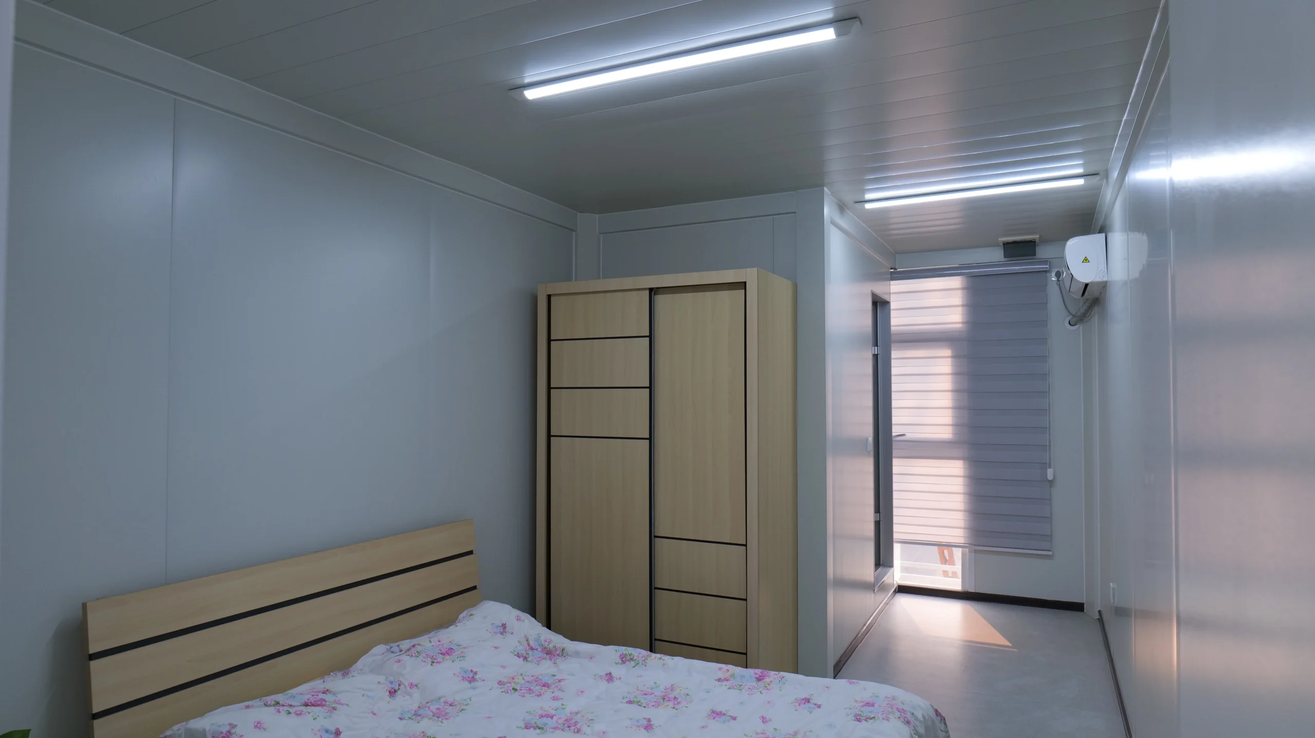 Single-occupancy modular bedroom illustrating a mining camp room standard