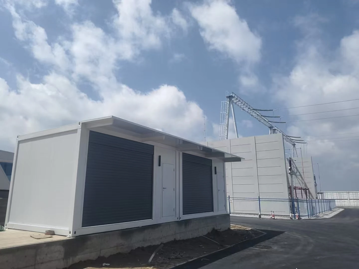 Relocatable modular project building installed at an energy infrastructure site