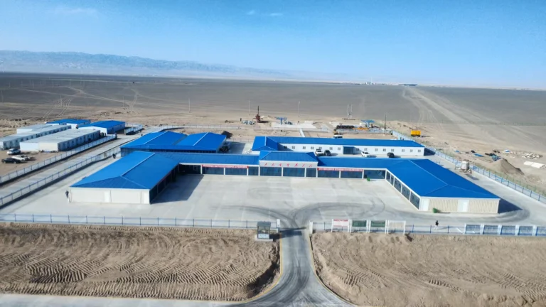 20-kuboprefab-aerial-view-of-a-blue-roof-modular-facility-complex